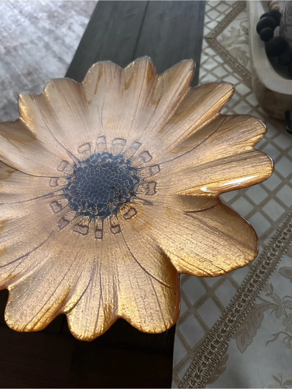 Gold sunflower glass decorative plate on a pedestal stand